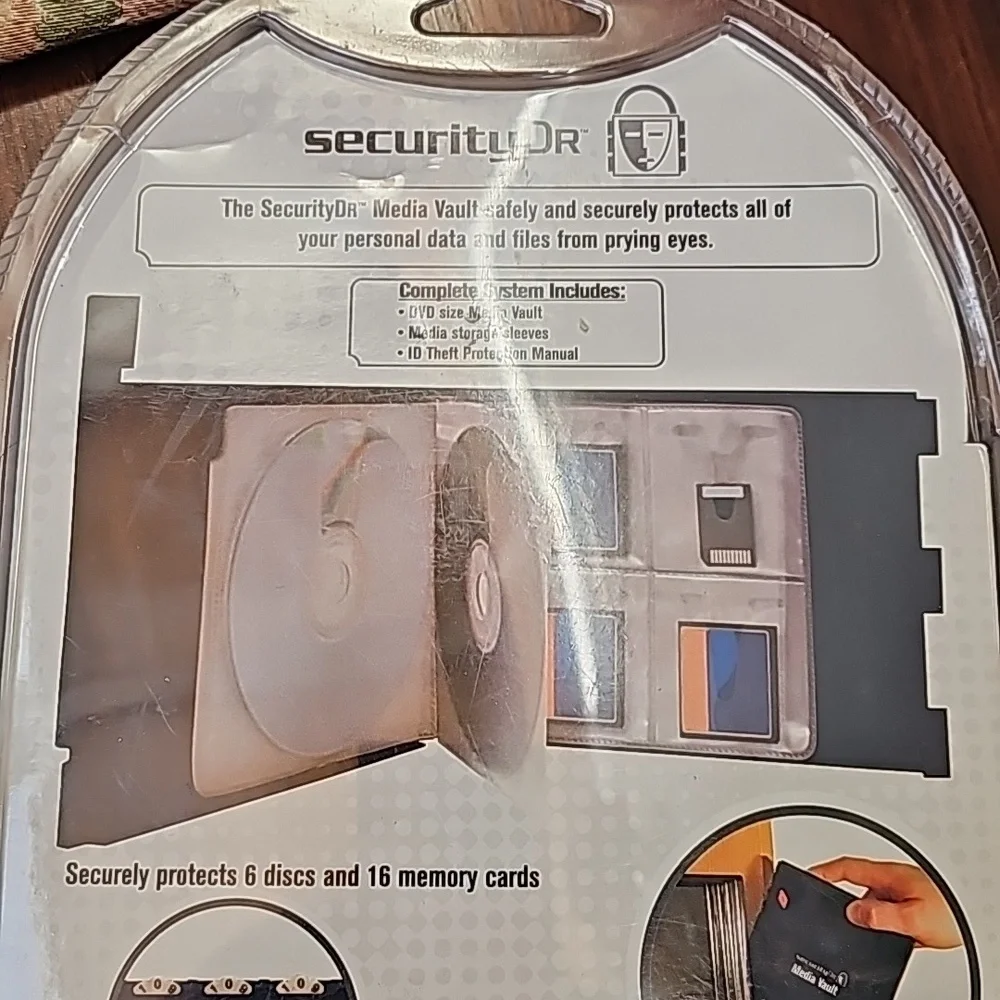 NEW sealed Media Vault safely and securely protects 6 Discs and 16 Memory
